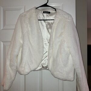 Women’s fluffy white coat